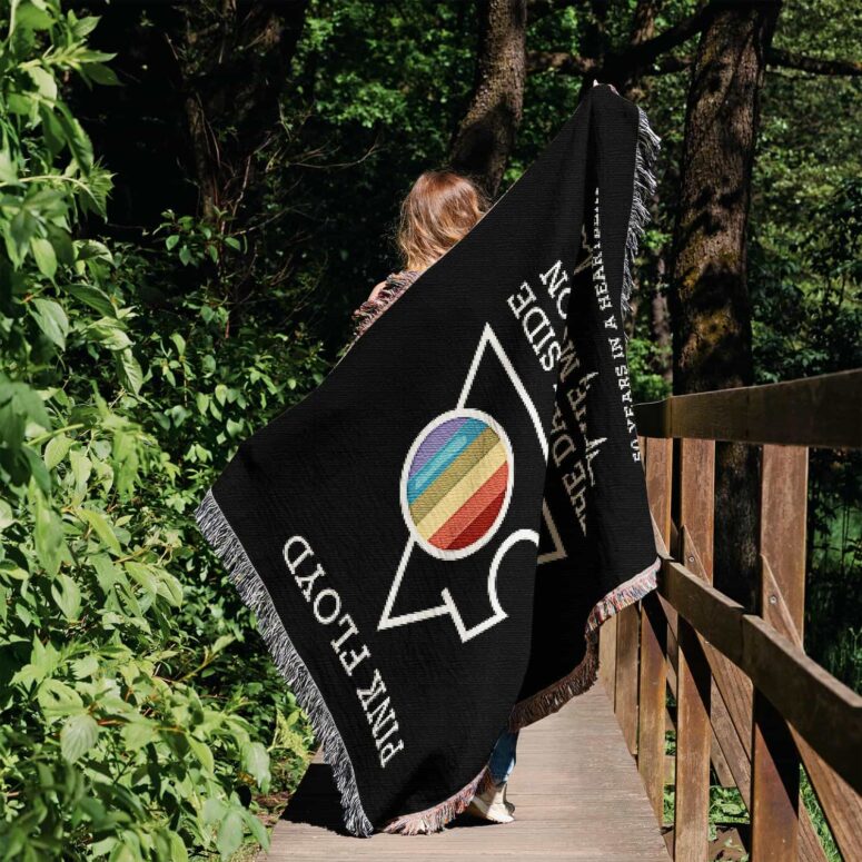 The Dark Side Of The Moon 50 years in a heartbeat Woven Blanket