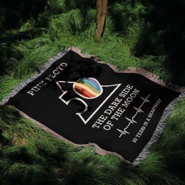 The Dark Side Of The Moon 50 years in a heartbeat Woven Blanket