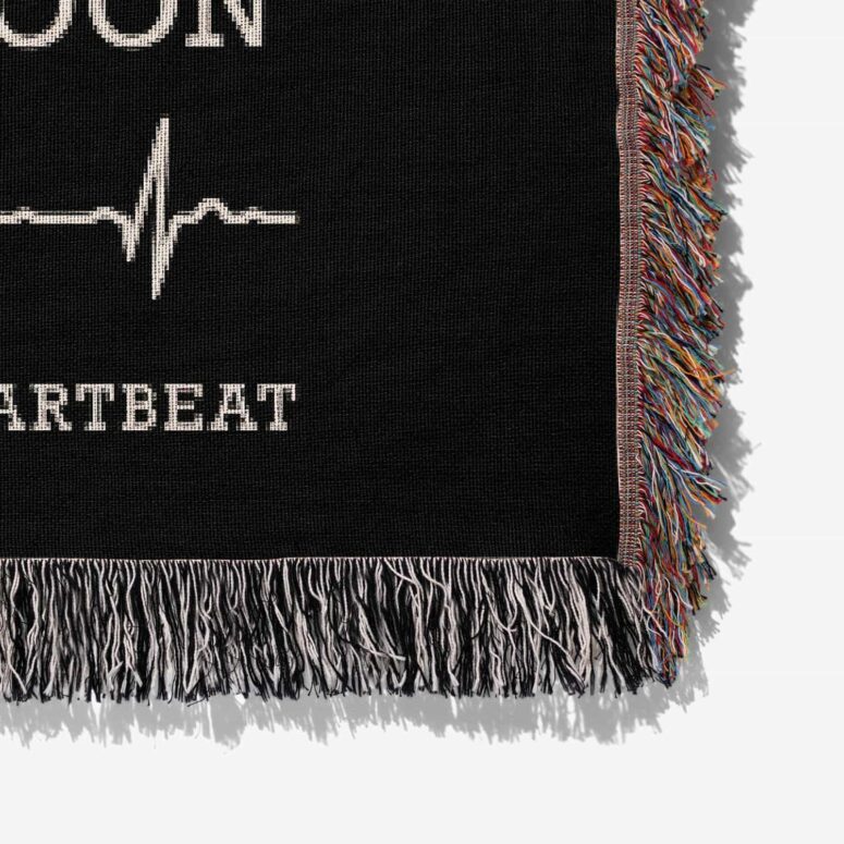 The Dark Side Of The Moon 50 years in a heartbeat Woven Blanket